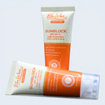 Two tubes of Bluwon sunblock cream on a light gray background