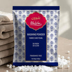 Bluwon washing powder package with folded towels and pearls in the background